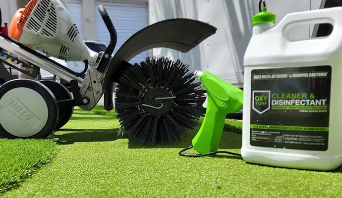 Artificial grass maintenance tools with power brush and turf cleaner